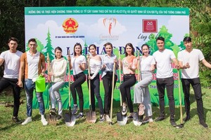Seven beauties that represented Vietnam to compete in Miss Earth beauty pageants over the years participate in a tree planting movement in Lam Dong. 
