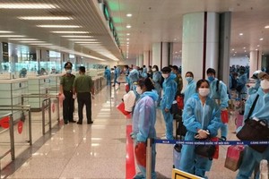 International arrivals at the Noi Bai international airport (Photo:VNA)