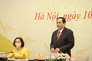 Standing Vice Chairman of the NA and Standing Vice Chairman of the NEC Tran Thanh Man speaks at the event (Photo: VNA)