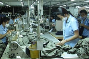 Workers at a garment factory in Vietnam. (Photo: VNA)
