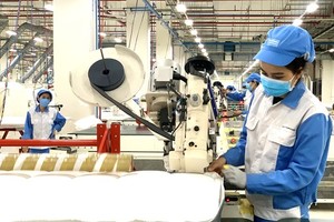 Workers of Nitori Company in Ba Ria-Vung Tau Province are working in the new normal state. (Photo: SGGP)