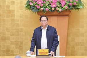 Prime Minister Pham Minh Chinh speaks at online meeting between the National Steering Committee for Covid-19 Prevention and Control with the steering committees of 63 provinces and cities (Photo: SGGP)