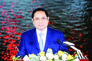 Prime Minister Pham Minh Chinh speaks at the opening ceremony of the event.