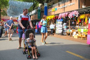 ​Foreign tourists visit HCMC Book Street.