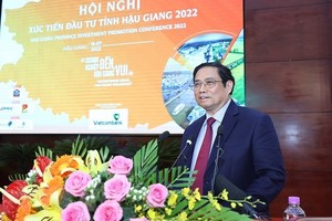 Prime Minister Pham Minh Chinh speaks at the conference. (Photo: VNA)