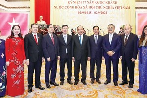 President Nguyen Xuan Phuc, central and Hanoi officials, along with foreign diplomats and heads of international organizations attent the event. (Photo: SGGP)