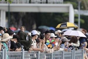 housands of people flock to Bach Dang Pier to enjoy a hot air balloon celebrating the 77th anniversary of National Day (September 2) that is held at the Sai Gon River Tunnel on September 2. ​