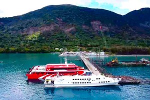High-speed boats anchor at port due to bad weather.