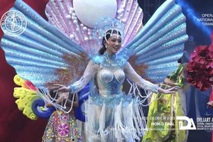 Vietnamese contestant wins the “Best National Costume '' title.