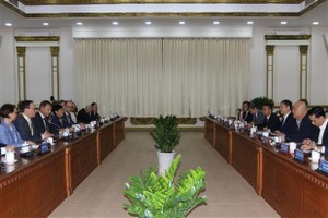 Participants at the meeting (Photo: VNA)