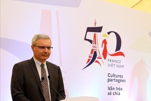 French Ambassador Nicolas Warnery speaks at the press conference on March 14. (Photo: VNA)