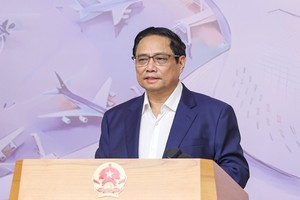 Prime Minister Pham Minh Chinh speaks at the meeting. (Photo: SGGP)