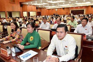 Delegates attend the 10th session of the 10th tenure People's Council of HCMC which opened on July 10. (Photo: SGGP)