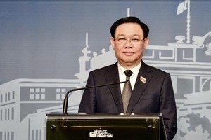 NA Chairman Vuong Dinh Hue at a press conference during his official visit to Bulgaria (Photo: VNA)