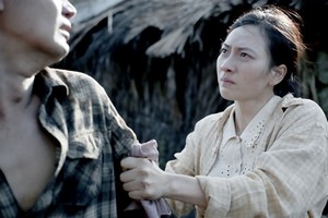 Actress Phuong Anh Dao, who plays Nhan, in a scene from 'Glorious Ashes'. (Photo courtesy of An Nam Films)