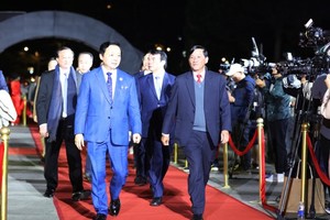 Deputy Prime Minister Tran Hong Ha (L) attends the opening ceremony of the 23rd Vietnam Film Festival on November 21. (Photo: SGGP)