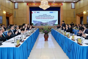 At a roundtable discussion on “Infrastructure readiness for the semiconductor industry in Vietnam” in Hanoi on December 7 (Photo: SGGP)
