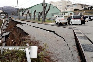 A road is damaged by the earthquake in Wajima city, Japan's Ishikawa perfecture on January 1. (Photo: VNA)