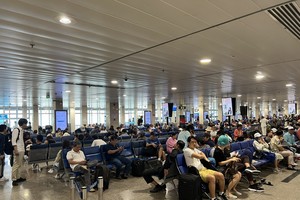 Tan Son Nhat International Airport in HCMC serves 934 flights on February 14 (Photo: SGGP)