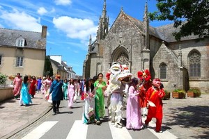 A parade is held to promote Vietnamese culture in Languidic City, in the Morbihan region of France.
