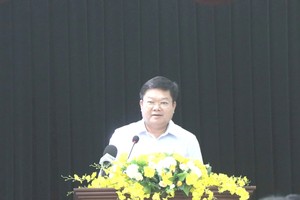 Director of the HCMC Department of Labor, Invalids and Social Affairs Le Van Thinh speaks at the event. (Photo: SGGP)