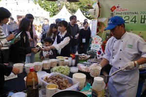 The event includes about 80 display booths and various areas for exhibitions on Pho culture, tourism, and economy.