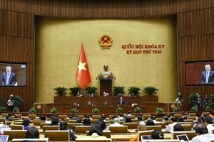 Participants at the seventh working day of 15th NA’s eighth session. (Photo: VNA)