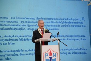 Head of the Internal Affairs Committee of HCMC Party Committee and President of the Vietnam-Laos Friendship Association's HCMC chapter Ngo Minh Chau speaks at the event. (Photo: SGGP)