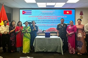 Delegates attend the gathering marking the 66th anniversary of Cuba's National Day (January 1, 1959-2025) in Ho Chi Minh City on the evening of December 22. (Photo: SGGP)
