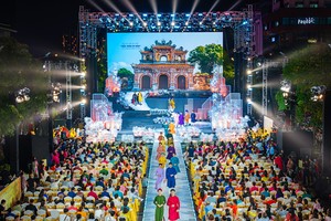A performance of the collection of Ao Dai (Vietnamese traditional dress) titled "Colors of heritage" by designer Nam Tuyen