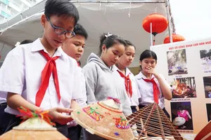 Exhibition featuring national intangible cultural heritage opens in Binh Dinh
