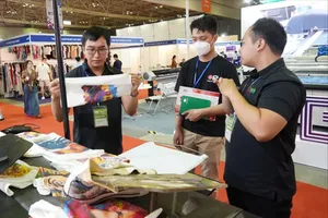 Digital printing technology for textile production is showcased at a Garment and Textile Industry Exhibition in HCMC. (Photo: SGGP)