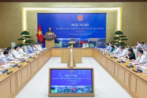 Prime Minister Pham Minh Chinh, Chairman of the Coordinating Council for the Red River Delta Region, presides over the 6th meeting of the Council. (Photo: SGGP)