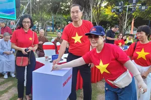 The charity walk raises over VND150 million (US$5,700) to support communities affected by Storm Bualoi. (Photo: SGGP)