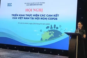 A representative of the organization board delivers a speech at the event. (Photo: SGGP)