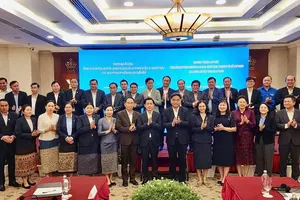 Delegates of the two sides attend the meeting. (Photo: SGGP)