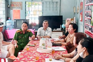 第十郡第十五坊第六街区调解组正处理关于公共通道纠纷。