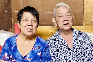 梁三弟和妻子黄慧英。