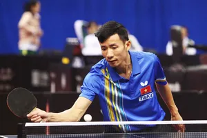 Tay vợt Đinh Quang Linh cùng tuyển Việt Nam giành vé vào bán kết nhóm 3. Ảnh: ITTF
