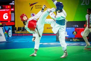 Trương Thị Kim Tuyền (trái) sẽ sang Kazakhstan tập huấn chuẩn bị tranh vé Olympic.