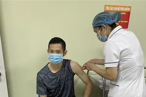 Tay vợt cầu lông Nguyễn Tiến Minh đã hoàn tất tiêm vaccine