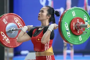 Lực sĩ Vương Thị Huyền chờ được chọn tham dự Olympic.