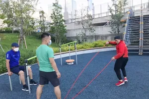 Các VĐV Việt Nam tập luyện sau khi nhập Làng VĐV. Ảnh: T.S