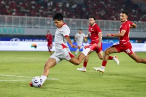 Pha dứt điểm mở tỷ số trận đấu của Văn Vĩ. Ảnh: TÔ AN