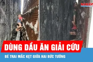 Dùng dầu ăn giải cứu bé trai mắc kẹt giữa hai bức tường