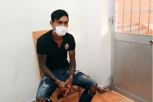 Đối tượng Nguyễn Hoàng Sơn tại cơ quan Công an. Ảnh: HẢI LINH