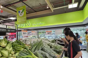 Nhóm sản phẩm Tick xanh được bố trí quầy kệ nổi bật tại siêu thị Co.opmart (ẢNH: PHƯƠNG AN)