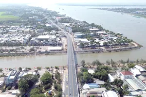 Cầu Hồng Ngự trên quốc lộ 30 đưa vào khai thác đầu năm 2026, góp phần hoàn thiện hạ tầng giao thông, thúc đẩy kinh tế khu vực biên giới tỉnh Đồng Tháp (ẢNH: VINH QUANG)