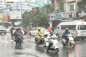 胡志明市下午和晚上有中雨、大雨和雷雨，局地有特大暴雨。 图：明海