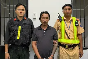 Huỳnh Minh Nhật tại cơ quan công an. Ảnh: CA